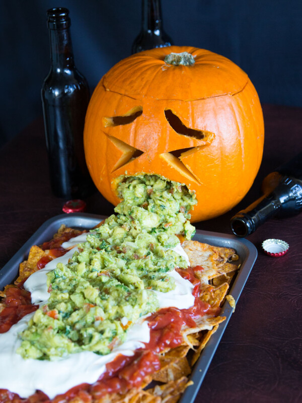 Pumpkin throwing up gaucamole over nachos