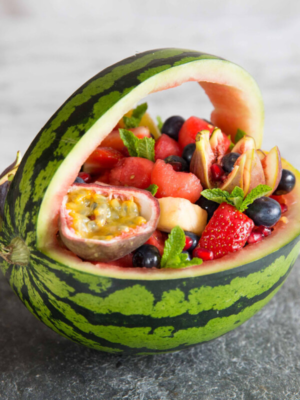 close up shot of watermelon basket on slate with marble background