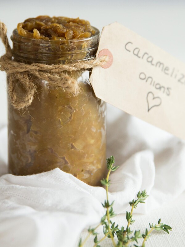 caramelized onions in a jar with string and a label