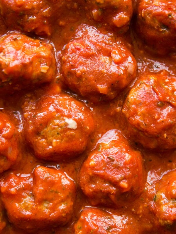 overhead close up shot of meatballs in sauce in skillet