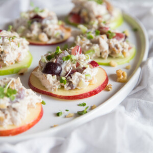 salad bites placed on long white tray garnish with cress