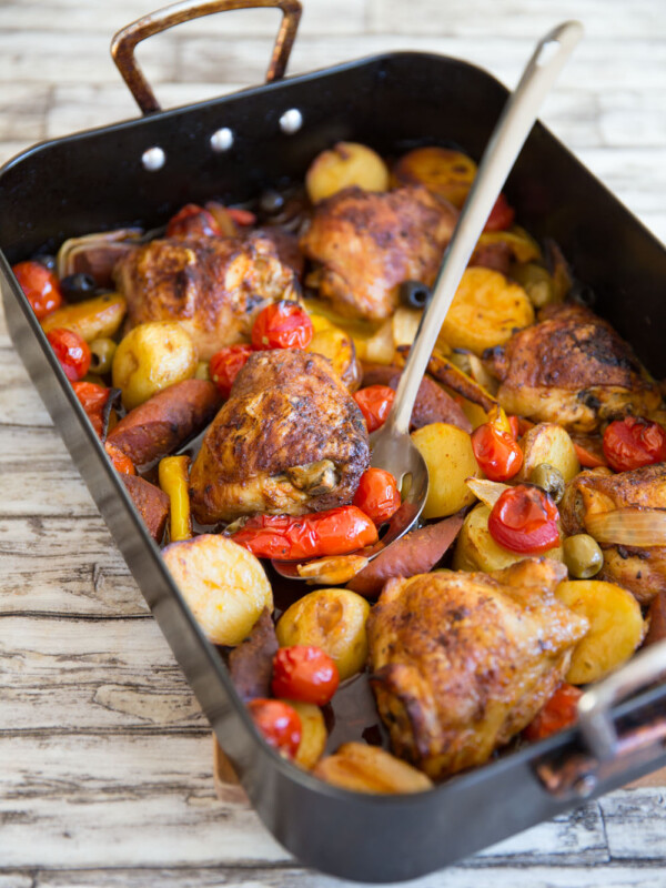 tray bake fresh out the oven with metal serving spoon digging in