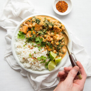 Chickpea Sweet Potato Curry with chilli flakes to serve