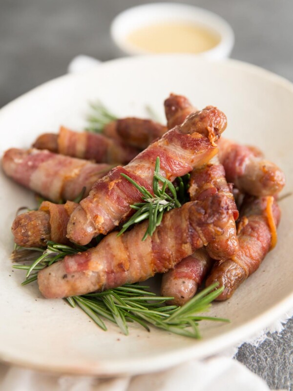 Homemade Pigs in Blankets served with fresh rosemary