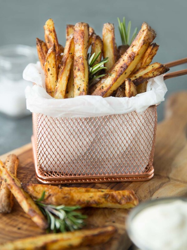 Crispy Oven Baked Fries with dip, fresh rosemary and sea salt