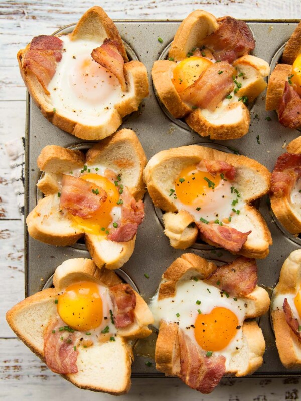 overhead shot of toast cups fresh out the oven garnished with chives