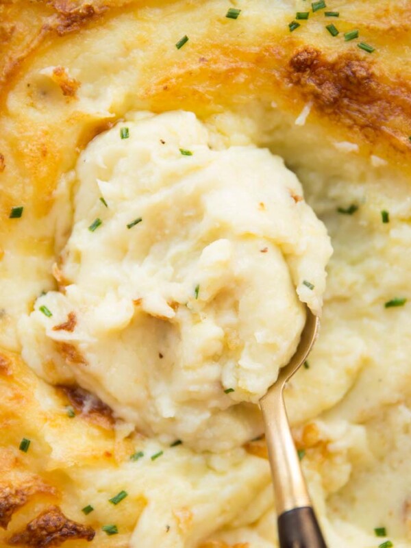 overhead shot of spoon scooping into mashed potato