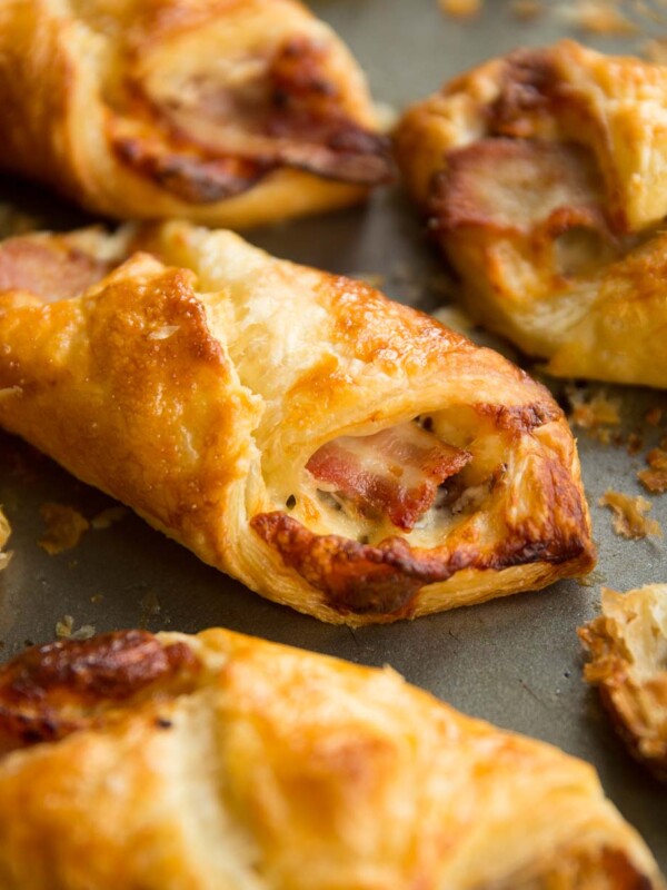 closeup over cheese and bacon turnover with focus on bacon