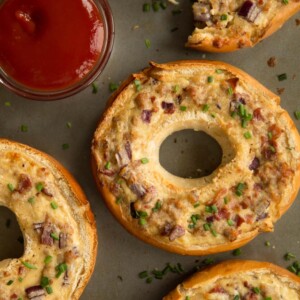 overhead shot of bagels with pot of ketchup