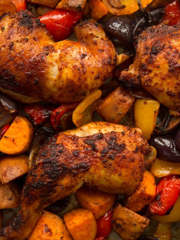 overhead shot of chicken leg tray bake in pan