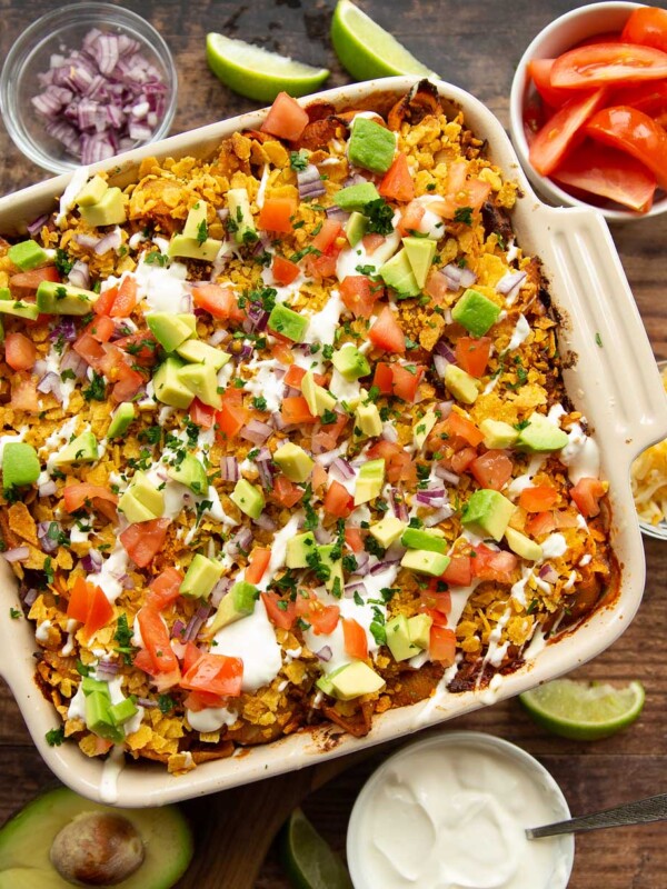 overhead shot of taco pasta with taco ingredients on top in casserole dish