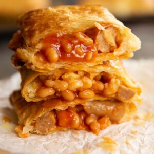 3 slices stacked on each other with beans spilling out