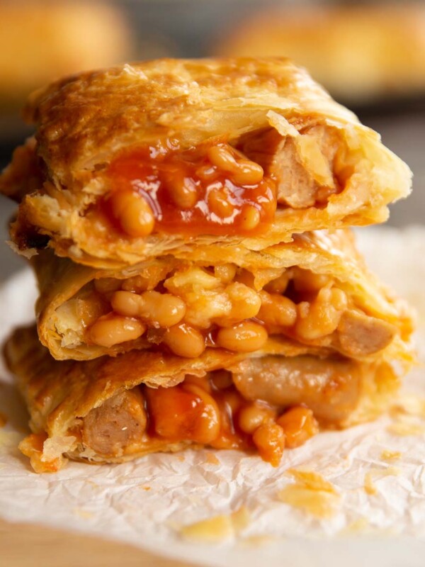 3 slices stacked on each other with beans spilling out