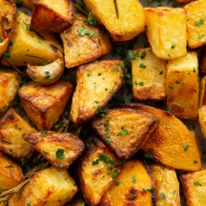 overhead shot of potatoes garnished with parsley fresh out the oven