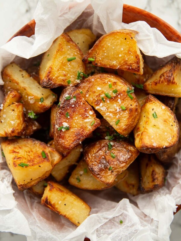 overhead shot of potatoes in scrunched up parchment paper