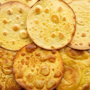 overhead shot of tostada shells overlapped on wire rack