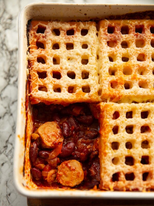 overhead shot of waffle cowboy pie with one waffle missing showing filling