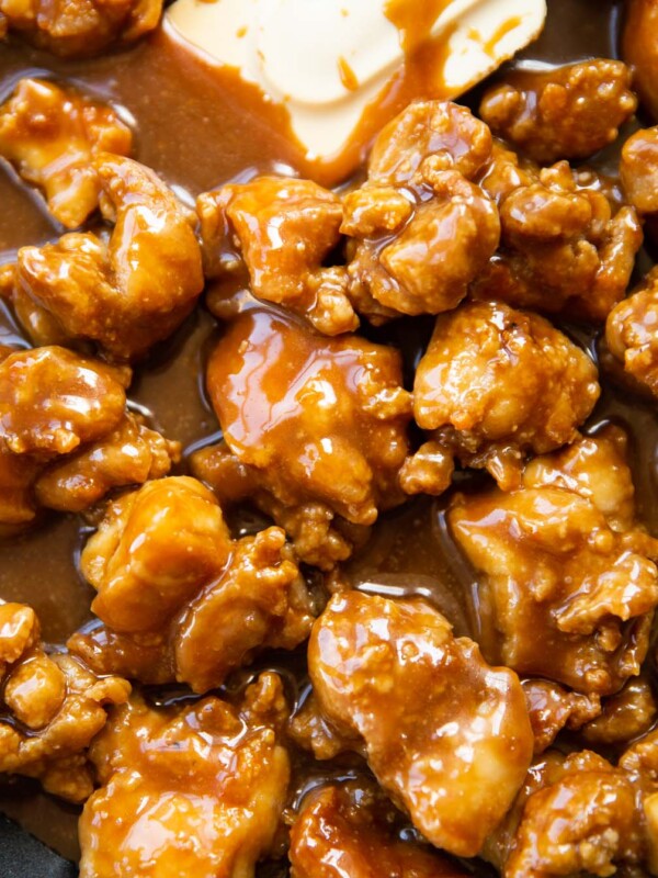 close up shot of salted caramel chicken in pan