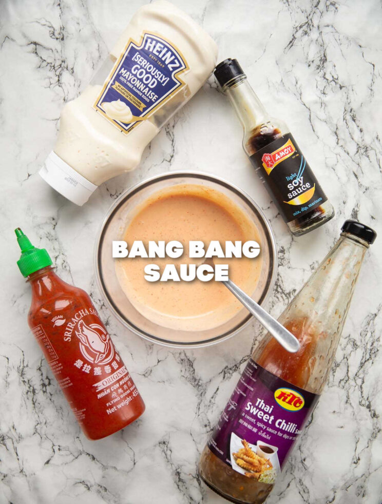 overhead shot of bang bang sauce ingredients on marble backdrop