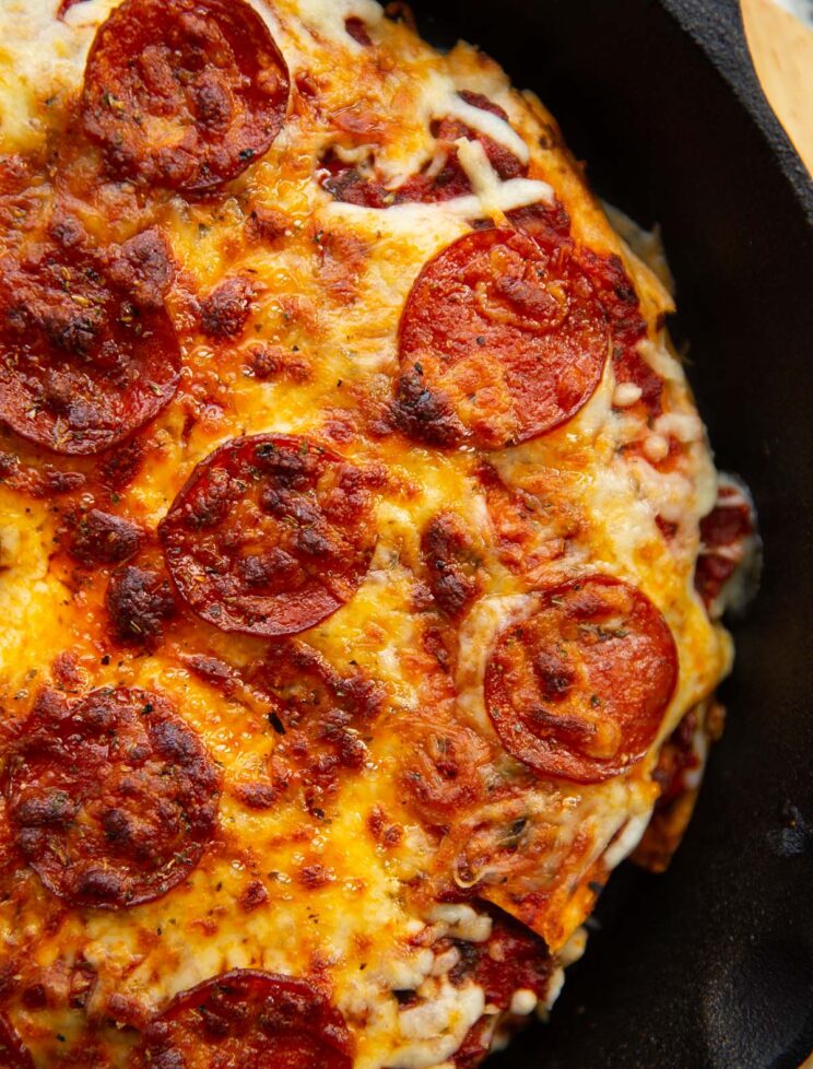 close up overhead shot of tortilla wrap pizza in pan