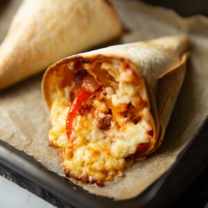 close up shot of quesadilla cone fresh out the oven on baking tray