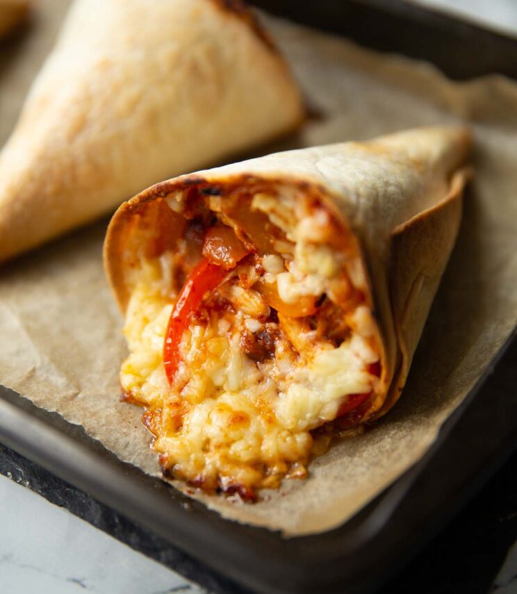 close up shot of quesadilla cone fresh out the oven on baking tray