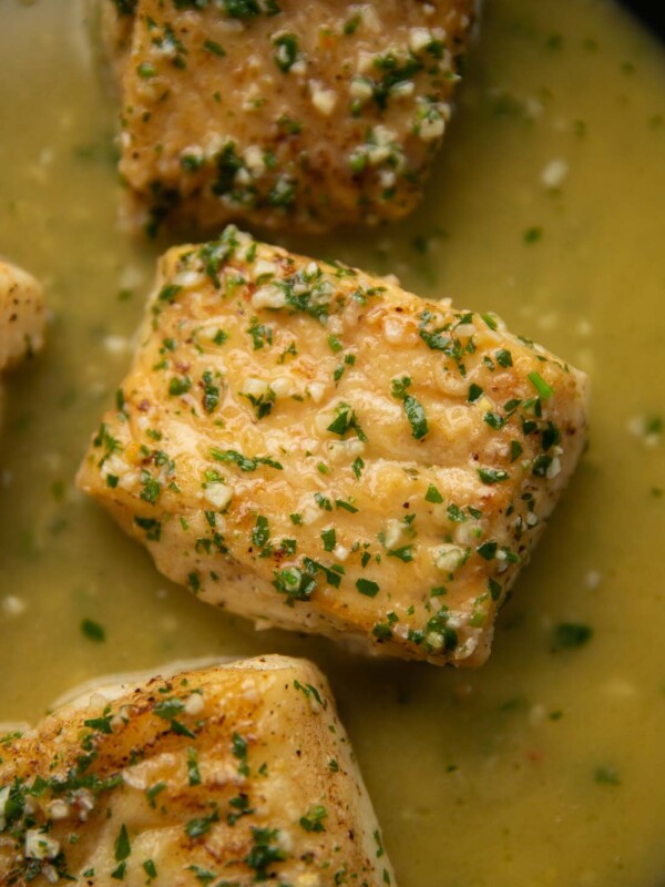 overhead shot of garlic butter cod in pan