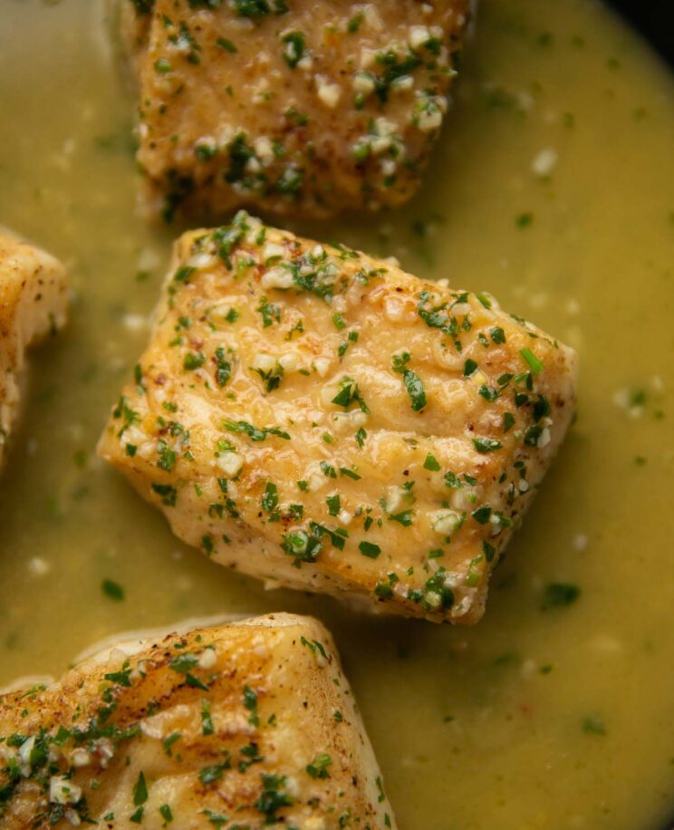 overhead shot of garlic butter cod in pan