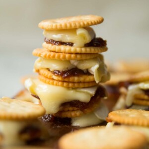 3 savory smores stacked on each other on chopping board