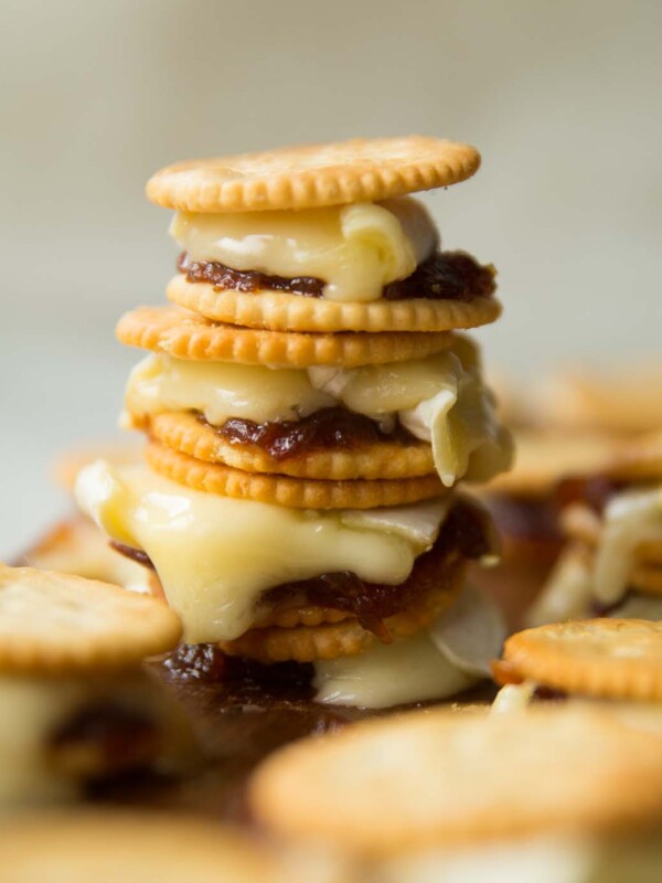 3 savory smores stacked on each other on chopping board