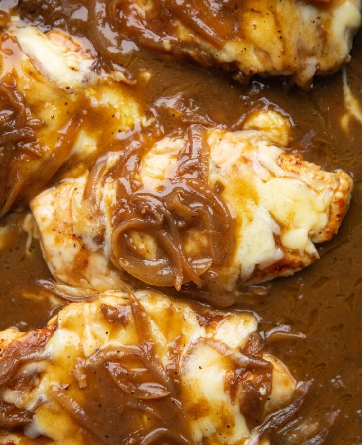 close up overhead shot of french onion chicken in pan