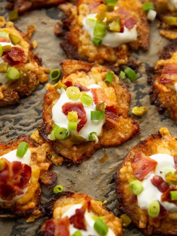 loaded smash potatoes on baking tray