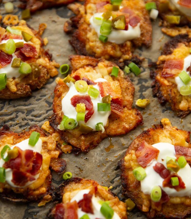 loaded smash potatoes on baking tray